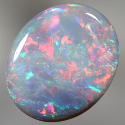 SOLID SEMI BLACK OPAL Rolling flashes of red over green and blue. SEE VIDEO